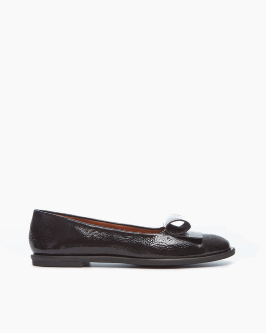 Side view of the Yale Loafer in Black Patent: featuring a chic, flexible sole morphing this formal loafer silhouette into one supremely fit for an on-the-go lifestyle.