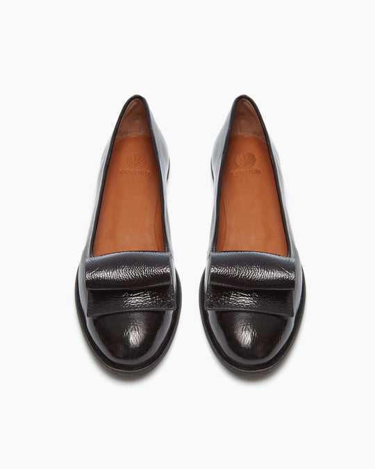 Front view of the Yale Loafer in Black Patent: featuring a chic, flexible sole morphing this formal loafer silhouette into one supremely fit for an on-the-go lifestyle.